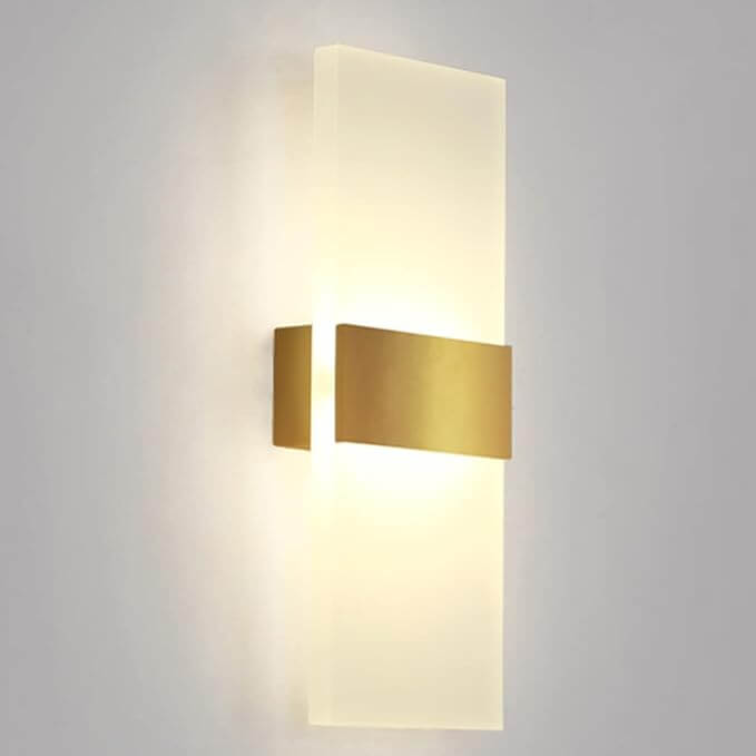 Modern LED wall lamp featuring brushed aluminum and acrylic design in gold foil finish, ideal for bedroom illumination.