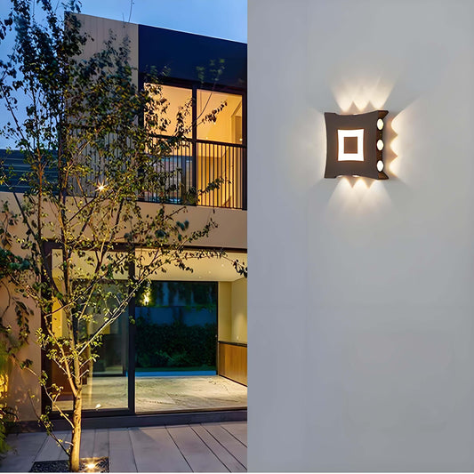 Modern LED waterproof wall light illuminating an outdoor space with minimalist design and multi-color effects.
