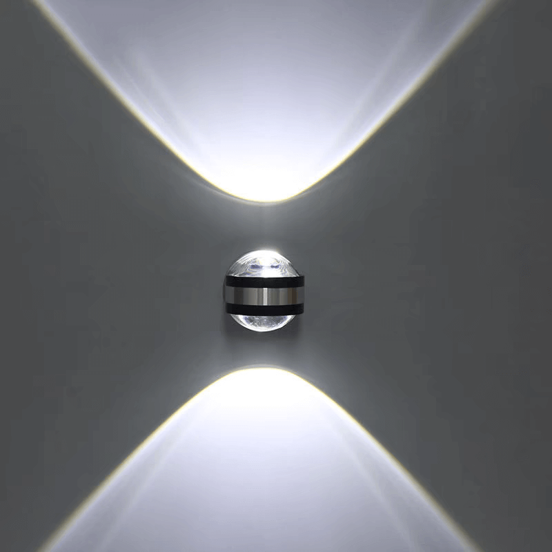 Modern LED wall light with crystal design, dual up/down lighting effect, ideal for home decor and ambient lighting.