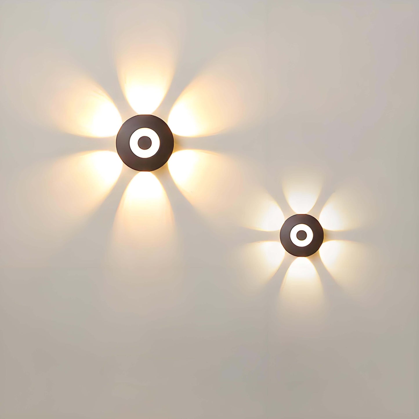 Stylish LED waterproof wall lights creating floral contours on a wall with warm light and artistic design.