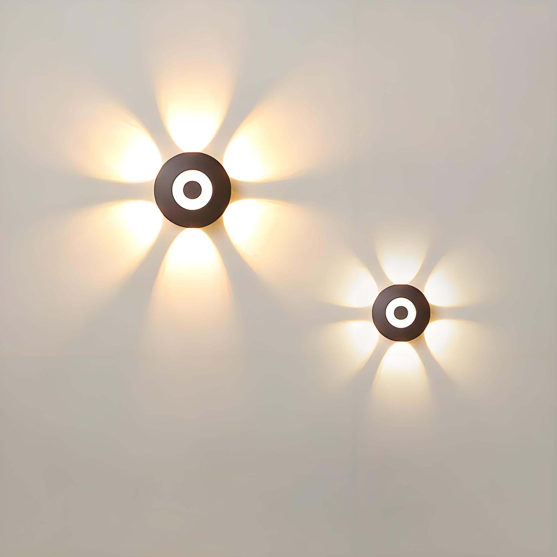 Stylish LED waterproof wall lights creating floral contours on a wall with warm light and artistic design.