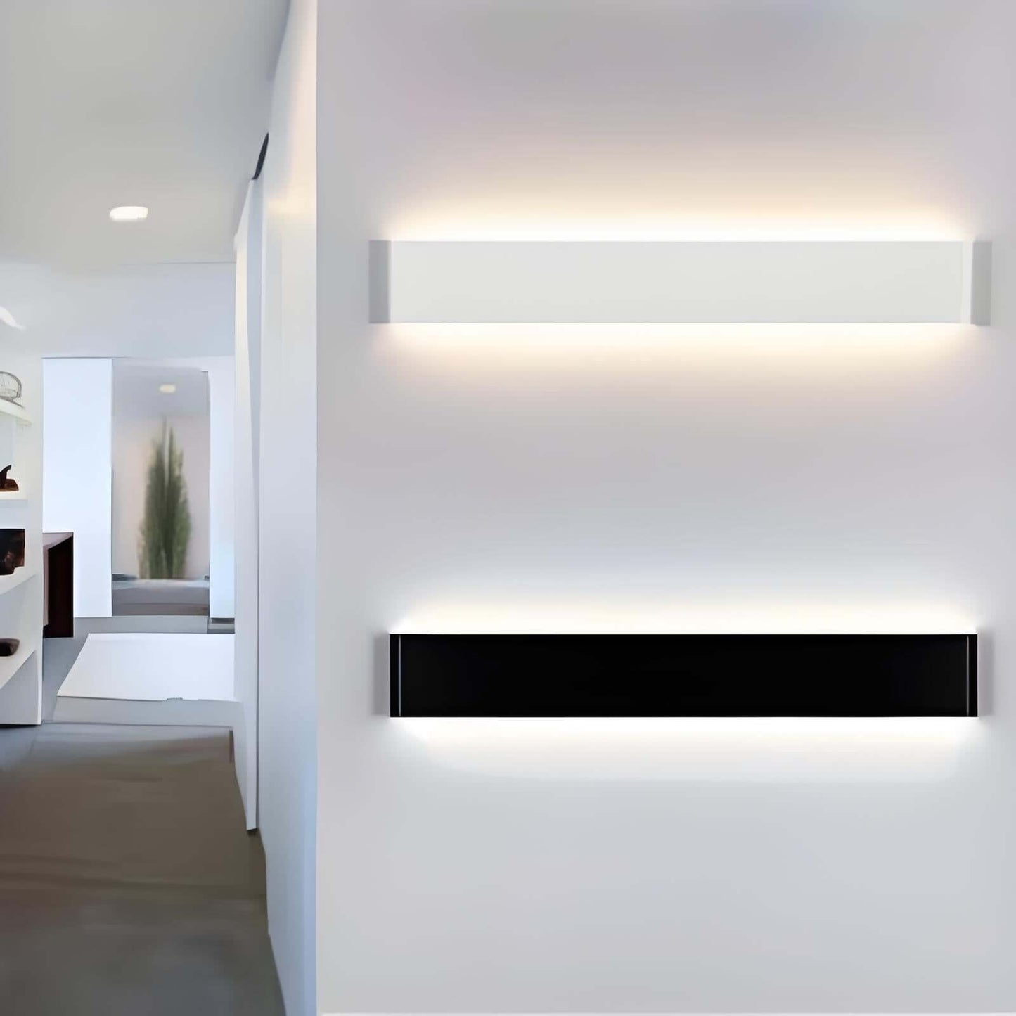 Modern LED strip lights in white and black against a stylish wall in a contemporary interior setting.