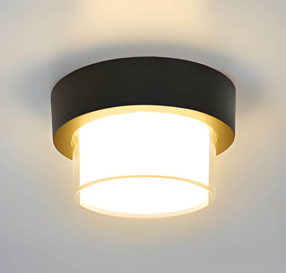 Modern minimalist outdoor LED wall light with black and gold design, providing waterproof exterior lighting.