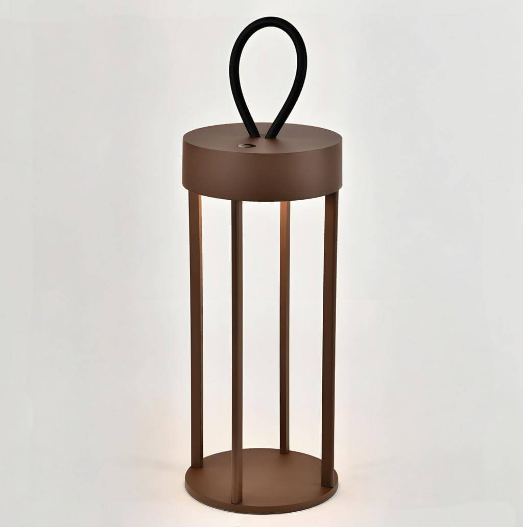 Portable rechargeable table lamp with handle, designed for study, reading, or camping.